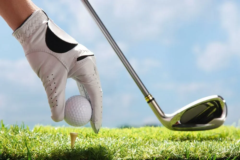 Golfový hráč v akci